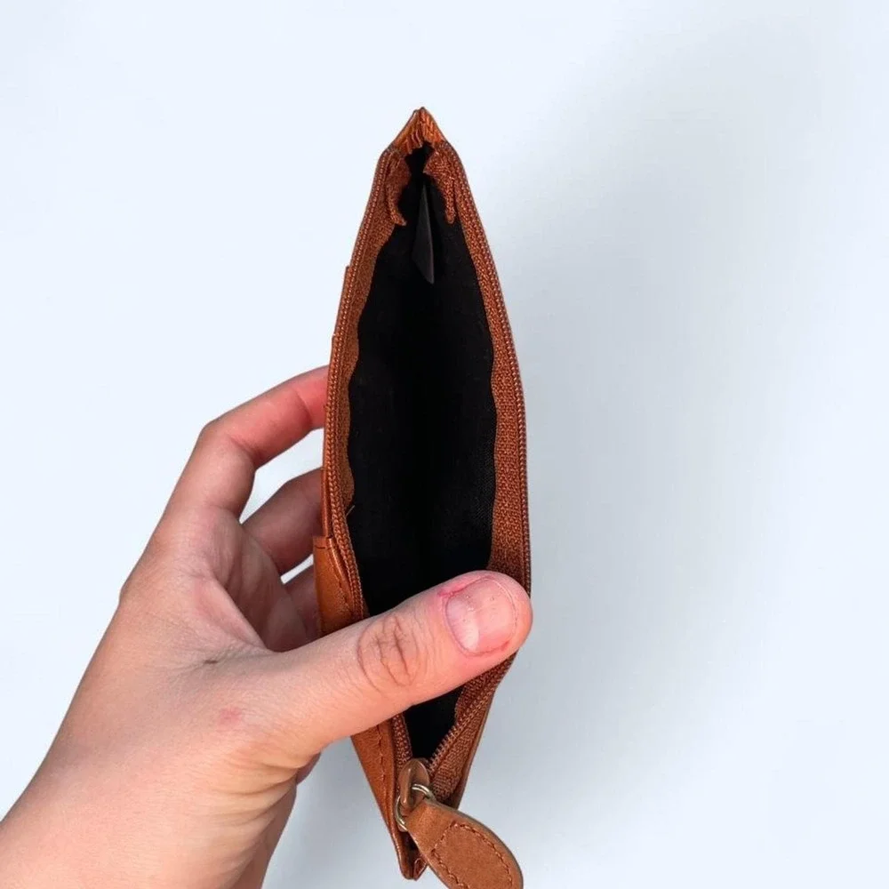 Brown leather wallet with multiple card slots and a zippered compartment
